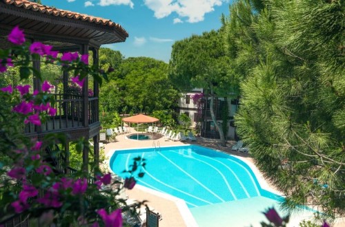 Outdoor pool view at Letoonia Golf Resort in Belek, Antalya. Travel with World Lifetime Journeys