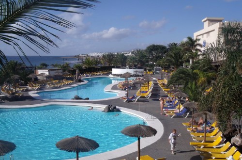 Outdoor pools at Beatriz Playa & Spa Hotel in Puerto del Carmen, Lanzarote. Travel with World Lifetime Journeys