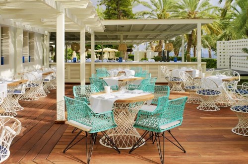 Outdoor terrace at H10 Big Sur in Los Cristianos, Tenerife. Travel with World Lifetime Journeys