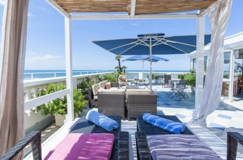 Outdoor terrace at The Palace Hotel in Viareggio, Italy. Travel with World Lifetime Journeys