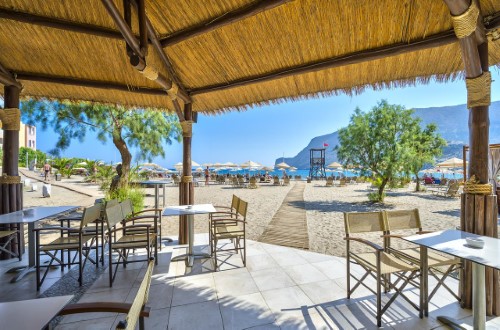 Outside beach terrace at Fodele Beach Water Park Resort in Crete, Greece. Travel with World Lifetime Journeys