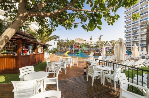 Outside pool area at Hotel Los Patos Park in Benalmadena, Spain. Travel with World Lifetime Journeys