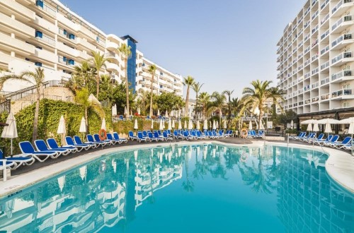 Outside pool at Hotel Los Patos Park in Benalmadena, Spain. Travel with World Lifetime Journeys