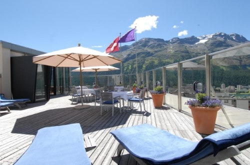 Outside terrace at Hotel Monopol in St. Moritz, Switzerland. Travel with World Lifetime Journeys