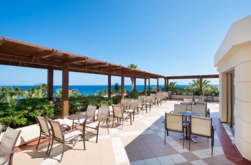 Outside terrace at Iberostar Creta Panorama and Mare in  Crete, Greece. Travel with World Lifetime Journeys