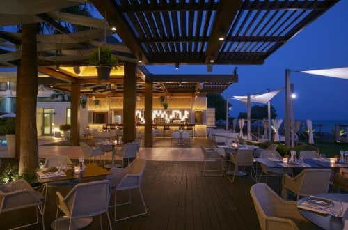 Outside terrace at Minoa Palace Imperial Resort and Spa in Chania area, Crete. Travel with World Lifetime Journeys