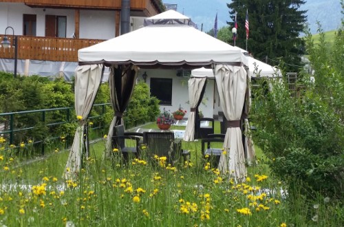 Outside terrace at Sport Hotel Barisetti in Cortina D’Ampezzo, Italy. Travel with World Lifetime Journeys