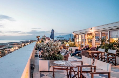 Outside terrace at The Palace Hotel in Viareggio, Italy. Travel with World Lifetime Journeys