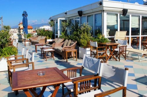 Outside terrace at The Palace Hotel in Viareggio, Italy. Travel with World Lifetime Journeys