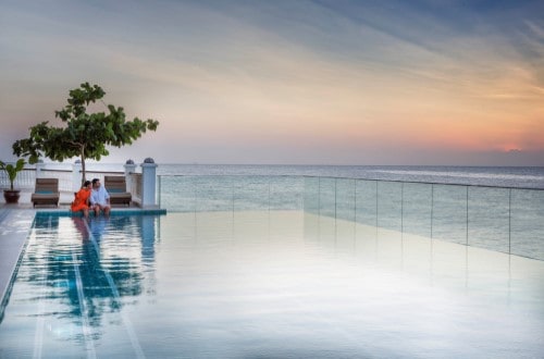 Pool Sunset at Park Hyatt Stone Town. Travel with World Lifetime Journeys