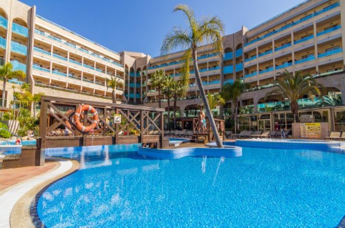 Pool area at Golden Bahia de Tossa and Spa in Tossa de Mar, Spain. Travel with World Lifetime Journeys