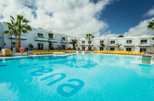 Pool side at Arena Beach Apartments in Corralejo, Fuerteventura. Travel with World Lifetime Journeys