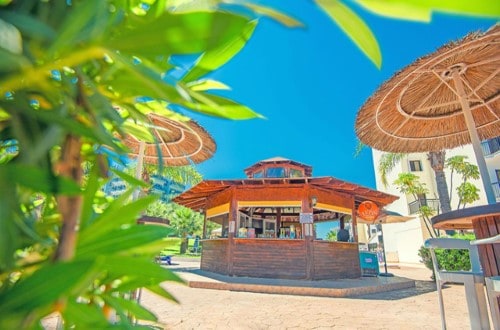 Pool bar at Tsokkos Gardens Hotel in Protaras, Cyprus. Travel with World Lifetime Journeys