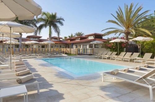 Pool side at Suite Hotel Atlantis Fuerteventura Resort, Corralejo. Travel with World Lifetime Journeys