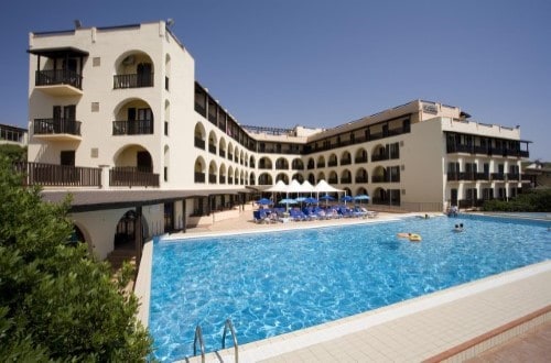 Pool side at Hotel Calabona in Alghero, Sardinia. Travel with World Lifetime Journeys