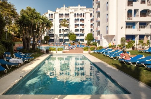 Pool side at Hotel PYR Marbella in Spain. Travel with World Lifetime Journeys