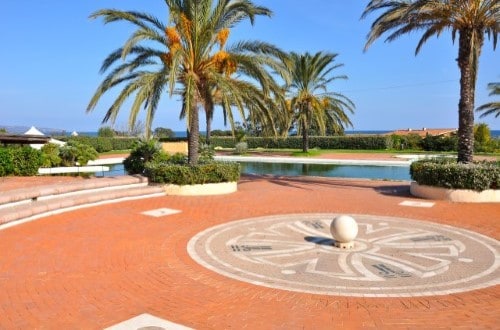 Pool side at Liscia Eldi Resort in San Teodoro, Sardinia. Travel with World Lifetime Journeys