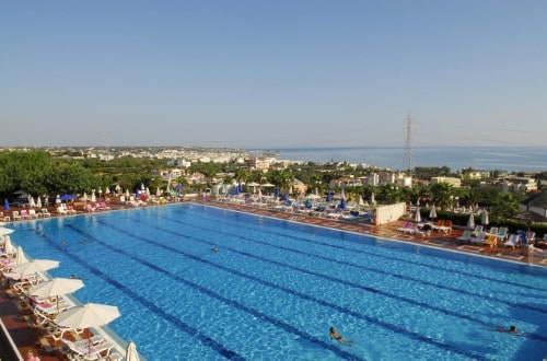 Pool side at Royal Belvedere Hotel in Crete, Greece. Travel with World Lifetime Journeys