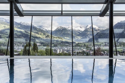 Pool view at Hotel Schloss Lebenberg in Kitzbühel, Austria. Travel with World Lifetime Journeys