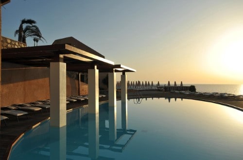 Pool view at Sea Side Resort and Spa in Crete, Greece. Travel with World Lifetime Journeys