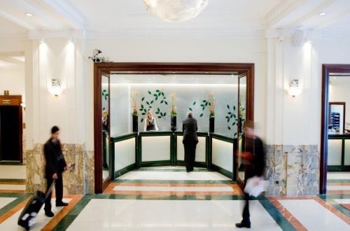 Reception area at Crowne Plaza – Le Palace in Brussels, Belgium. Travel with World Lifetime Journeys