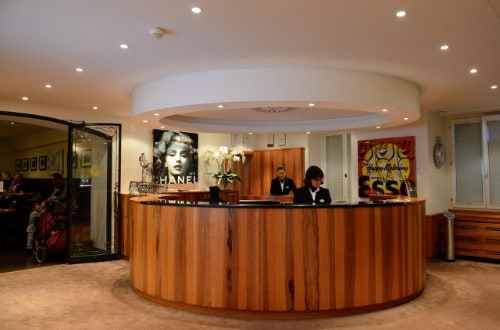 Reception area at Hotel Monopol in St. Moritz, Switzerland. Travel with World Lifetime Journeys