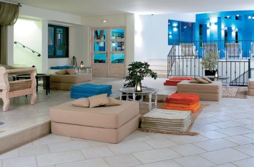 Relaxing area at Grecotel Plaza Spa Apartments in Rethymno, Crete. Travel with World Lifetime Journeys