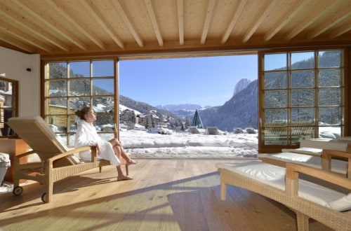 Relaxing room at Hotel Adler Dolomiti in Ortisei, Italy. Travel with World Lifetime Journeys