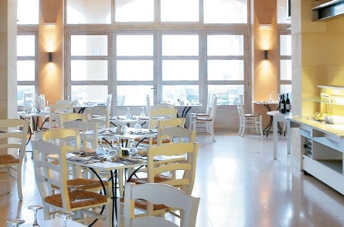 Restaurant at Grecotel Plaza Spa Apartments in Rethymno, Crete. Travel with World Lifetime Journeys