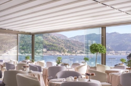 Restaurant view at Grand Hotel Atlantis Bay in Taormina, Sicily. Travel with World Lifetime Journeys