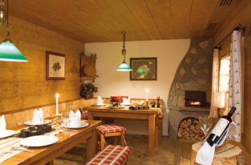 Restaurant view at Silvretta Parkhotel in Klosters, Switzerland. Travel with World Lifetime Journeys