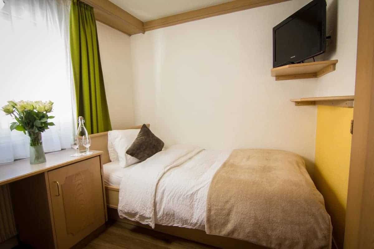 Single room at Bristol Hotel in Saas Fee, Switzerland. Travel with World Lifetime Journeys