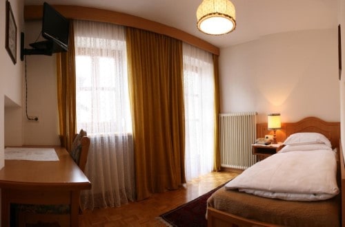 Single room at Hotel Dolomiti Madonna in Ortisei, Italy. Travel with World Lifetime Journeys