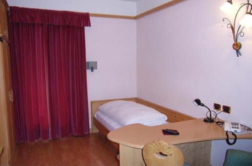 Single room at Hotel Olympia in Arabba, Italy. Travel with World Lifetime Journeys