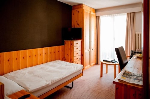 Single room at Hotel Sport Klosters, Switzerland. Travel with World Lifetime Journeys