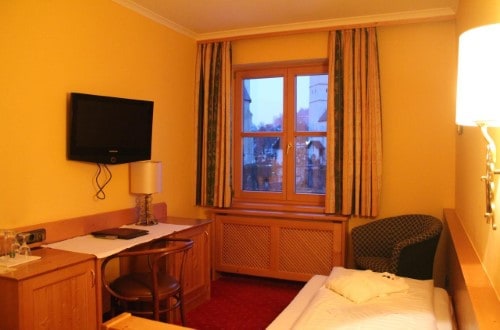 Single room at Hotel Tiefenbrunner in Kitzbühel, Austria. Travel with World Lifetime Journeys