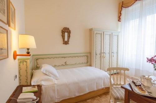 Single room at The Palace Hotel in Viareggio, Italy. Travel with World Lifetime Journeys