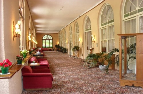 Sitting area at Miramonti Majestic Grand Hotel in Cortina D’Ampezzo, Italy. Travel with World Lifetime Journeys