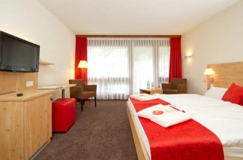 Standard room at Central Sporthotel in Davos, Switzerland. Travel with World Lifetime Journeys