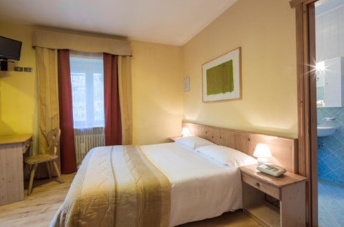 Standard room at Hotel Bellavista in Arabba, Italy. Travel with World Lifetime Journey