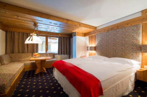 Standard room at Hotel Ferienart Resort & Spa in Saas Fee, Switzerland. Travel with World Lifetime Journeys