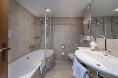 Suite bathroom at Sunstar Hotel Saas Fee, Switzerland. Travel with World Lifetime Journeys