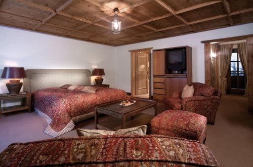 Suite room at Hotel Schwarzer Adler in Kitzbühel, Austria. Travel with World Lifetime Journeys