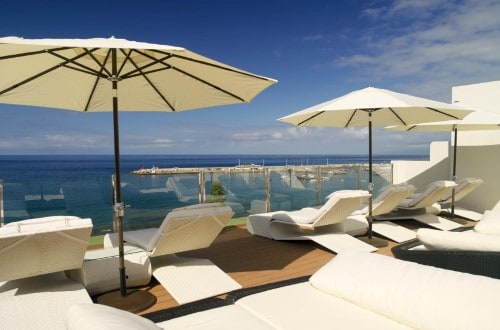 Sun lounges at H10 Big Sur in Los Cristianos, Tenerife. Travel with World Lifetime Journeys