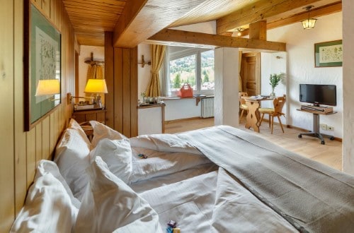 Superior room at Chalet Hotel Parc Victoria in Cortina D’Ampezzo, Italy. Travel with World Lifetime Journeys