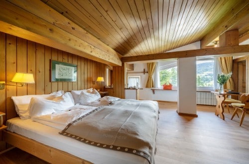 Superior room at Chalet Hotel Parc Victoria in Cortina D’Ampezzo, Italy. Travel with World Lifetime Journeys