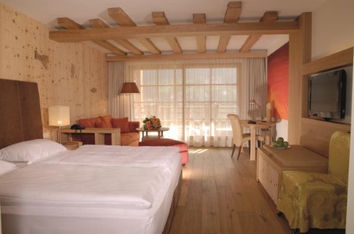 Superior room at Hotel Adler Dolomiti in Ortisei, Italy. Travel with World Lifetime Journeys