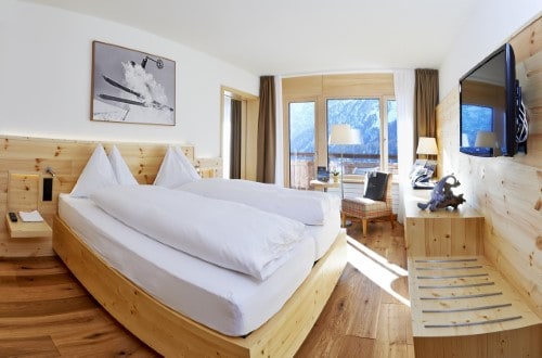 Superior room at Waldhotel National Superior Hotel in Arosa, Switzerland. Travel with World Lifetime Journeys