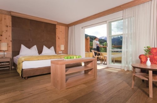 Superior room with balcony at Hotel Adler Dolomiti in Ortisei, Italy. Travel with World Lifetime Journeys