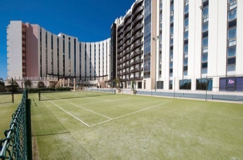 Tennis courts at Vila Gale Ampalius Hotel in Vilamoura on Algarve coast, Portugal. Travel with World Lifetime Journeys